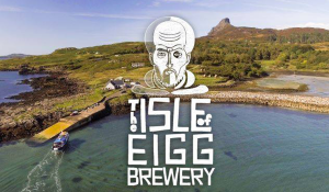 Isle of Eigg Brewery logo superimposed on a photo of Eigg's harbour